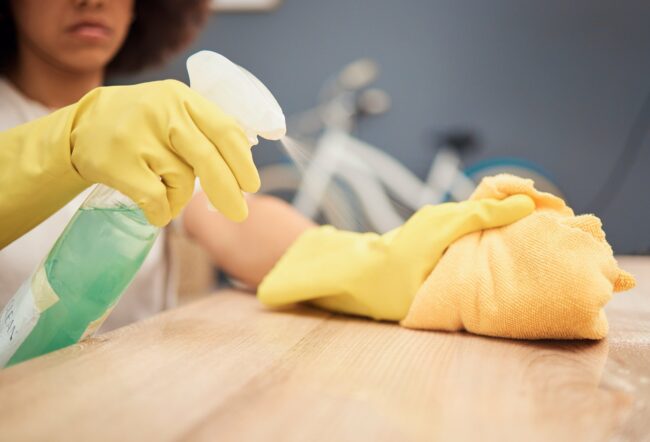 OCD-cleaning Woman cleaning with gloves because of contamination OCD.