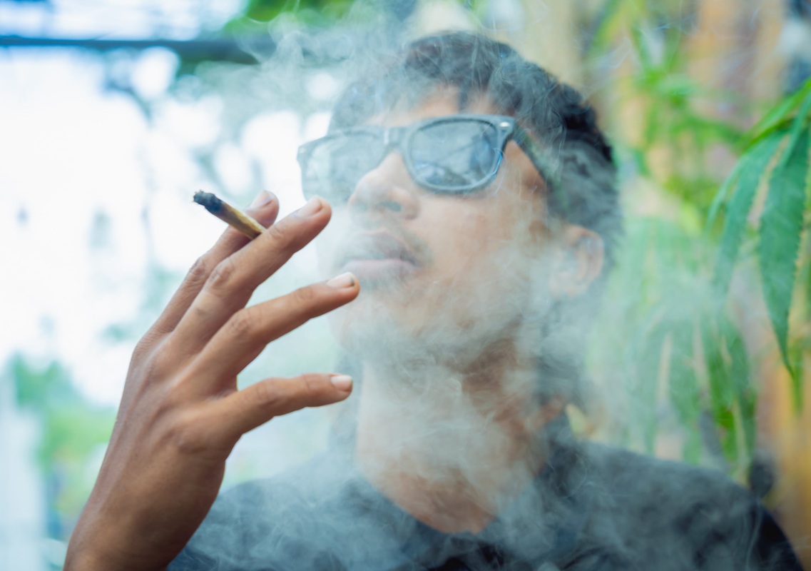 man considering quitting weed